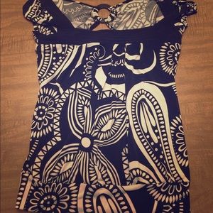 Tank with cutout back